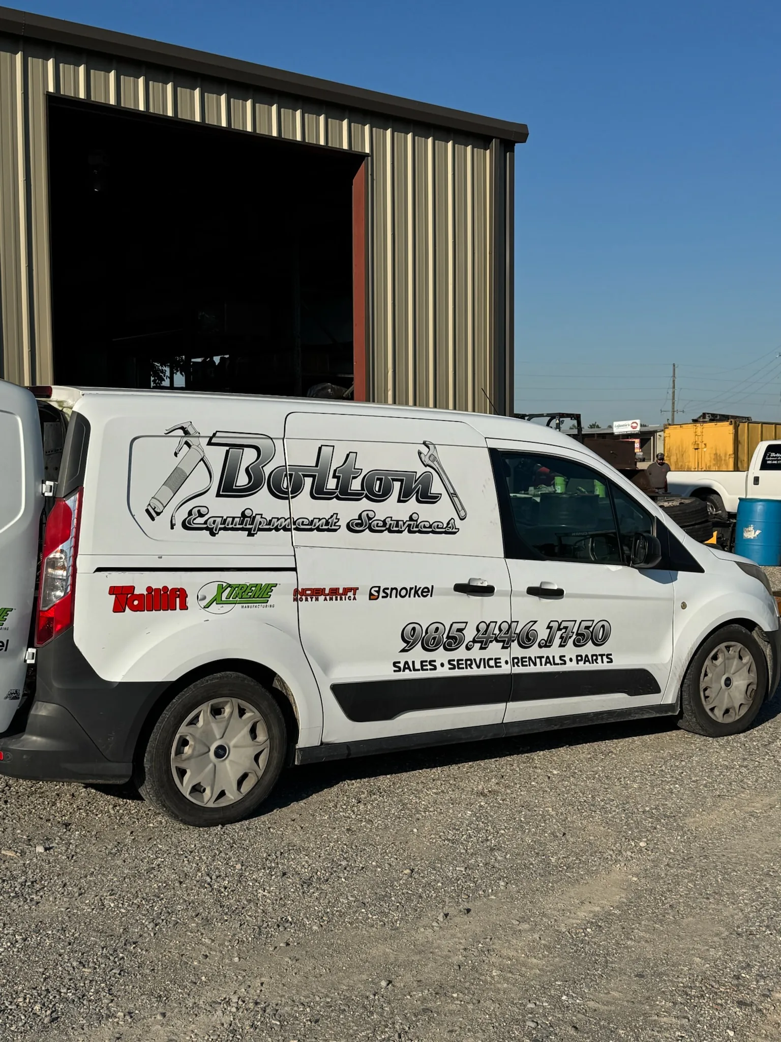 Bolton Equipment Services field service van parked at the Thibodaux shop bay